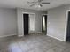 Spacious bedroom with mirrored closet doors at 7222 N Ola Ave, Tampa, FL 33604