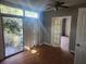 Bright bedroom with access to the backyard at 7222 N Ola Ave, Tampa, FL 33604