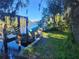 Rustic boat dock with damaged boat on the river at 7222 N Ola Ave, Tampa, FL 33604