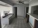 Kitchen with breakfast bar and fireplace at 7222 N Ola Ave, Tampa, FL 33604