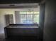Kitchen features a breakfast bar and pond view at 7222 N Ola Ave, Tampa, FL 33604