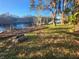 Rustic waterfront lot with boat lift and dock. Needs TLC at 7222 N Ola Ave, Tampa, FL 33604