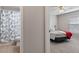Bedroom with a bed and en-suite bathroom at 7423 Woodhollow Rd, Spring Hill, FL 34606