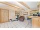 Bonus room featuring a sitting area, tile floors, a window AC unit and space for storage at 7600 138Th St, Seminole, FL 33776