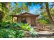 Charming one-story guest house nestled amidst lush greenery at 7600 138Th St, Seminole, FL 33776