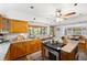 Kitchen featuring granite countertops, stainless steel appliances, and a bright breakfast nook at 7600 138Th St, Seminole, FL 33776