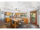 Well-equipped kitchen with an island, granite countertops, and a view to the back yard at 7600 138Th St, Seminole, FL 33776