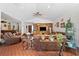 Bright and airy living room with terracotta tile flooring and an open floorplan at 7600 138Th St, Seminole, FL 33776