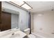 Bathroom with tub, vanity, and skylight at 7717 Cosme Dr # 2, Hudson, FL 34667