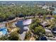 Community overview featuring a lake and pool at 8190 Sturbridge Ct, Weeki Wachee, FL 34613
