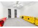 Spacious bedroom with carpeting and access to bathroom at 8190 Sturbridge Ct, Weeki Wachee, FL 34613