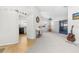 Spacious living room with view of kitchen and sliding doors at 8190 Sturbridge Ct, Weeki Wachee, FL 34613
