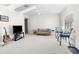 Bright living room with comfy sofa, TV, and dining area at 8190 Sturbridge Ct, Weeki Wachee, FL 34613