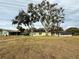 Aerial view showing home's location and surrounding landscape at 8704 Winding Wood Dr, Port Richey, FL 34668
