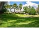 Community center surrounded by lush landscaping at 11645 Belle Haven Dr, New Port Richey, FL 34654