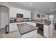 Well-equipped kitchen with white cabinetry, dark countertops, and modern appliances for a functional cooking space at 11645 Belle Haven Dr, New Port Richey, FL 34654