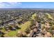 Aerial view showing community near golf course and ocean at 12814 Wedgewood Way # C, Hudson, FL 34667