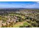 Wide aerial view of community and surrounding landscape at 12814 Wedgewood Way # C, Hudson, FL 34667