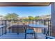 Private balcony with table and chairs, offering scenic views at 12814 Wedgewood Way # C, Hudson, FL 34667