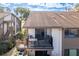Private balcony with table and grill, offering an outdoor space at 12814 Wedgewood Way # C, Hudson, FL 34667