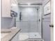 Bathroom with a large walk-in shower and white vanity at 12814 Wedgewood Way # C, Hudson, FL 34667
