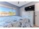 Bedroom with a large window overlooking the community at 12814 Wedgewood Way # C, Hudson, FL 34667