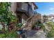 Exterior view showing stairs, landscaping, and entrance at 12814 Wedgewood Way # C, Hudson, FL 34667