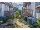 Pathway between condo buildings with landscaping at 12814 Wedgewood Way # C, Hudson, FL 34667