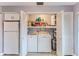 Stackable washer and dryer in a closet laundry room at 12814 Wedgewood Way # C, Hudson, FL 34667