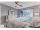Main bedroom with a king-size bed and window view at 12814 Wedgewood Way # C, Hudson, FL 34667