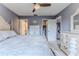 King-size bed in main bedroom with double vanity at 12814 Wedgewood Way # C, Hudson, FL 34667