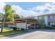 Carport with parking space for condo residents at 12814 Wedgewood Way # C, Hudson, FL 34667