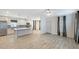 Open-concept kitchen and living area with tile flooring and modern finishes at 14287 Rialto Ave, Brooksville, FL 34613