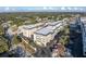 Aerial view of building and parking lot at 155 Bluff View Dr # 103, Belleair Bluffs, FL 33770