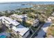 Aerial view of building and waterfront at 155 Bluff View Dr # 103, Belleair Bluffs, FL 33770