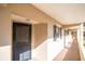 Condo building exterior showing entrance and walkway at 155 Bluff View Dr # 103, Belleair Bluffs, FL 33770