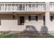 Close-up of condo building exterior, showcasing architectural details and balcony at 155 Bluff View Dr # 103, Belleair Bluffs, FL 33770