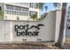 Community entrance sign for Port Bellaire at 155 Bluff View Dr # 103, Belleair Bluffs, FL 33770