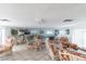 Community room with seating, tables, and a pool table at 155 Bluff View Dr # 103, Belleair Bluffs, FL 33770