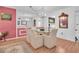 Dining room features a glass-top table and neutral-toned chairs at 155 Bluff View Dr # 103, Belleair Bluffs, FL 33770