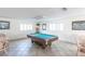 Game room featuring a pool table and comfortable seating at 155 Bluff View Dr # 103, Belleair Bluffs, FL 33770