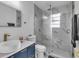 Modern bathroom with marble tile, glass shower, and updated fixtures at 15950 Adobe Dr, Hudson, FL 34667