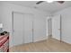 Simple bedroom with closet and wood-look flooring at 15950 Adobe Dr, Hudson, FL 34667