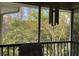 Tranquil screened balcony with wooded preserve views at 21107 Fountain View Ln # 5304, Lutz, FL 33558