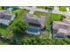 An aerial view of the property with a pool and solar panels at 2118 Huntington Ave, Sarasota, FL 34232