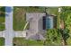 Aerial view showcasing the home's screened-in pool and expansive backyard at 2118 Huntington Ave, Sarasota, FL 34232