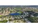 Scenic aerial view overlooking the community with golf course and lake at 2118 Huntington Ave, Sarasota, FL 34232