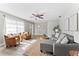 Spacious living room with comfortable seating, natural light, and stylish decor at 2118 Huntington Ave, Sarasota, FL 34232
