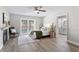 Spacious main bedroom with fireplace, ensuite bathroom, and pool access at 2118 Huntington Ave, Sarasota, FL 34232
