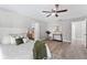 Large main bedroom with ample space, wood-look floors, and ceiling fan at 2118 Huntington Ave, Sarasota, FL 34232